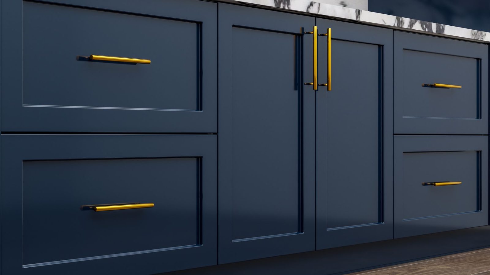 Cabinet painted deep navy blue with brass hardware